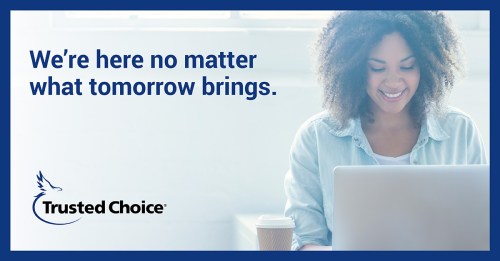 Woman with coffee and a laptop