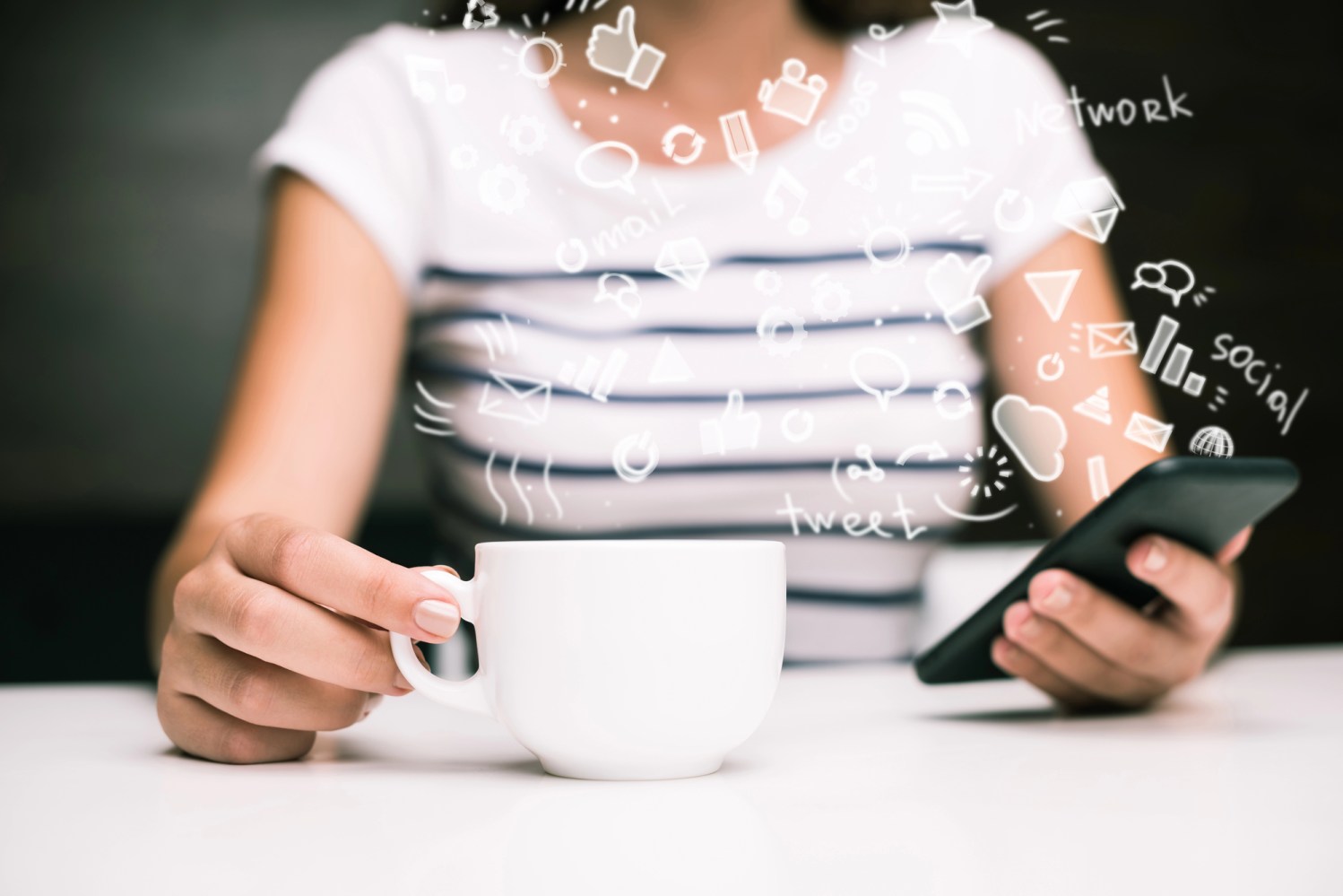 woman holding coffee cup