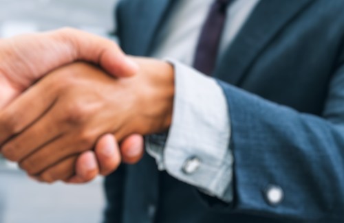 Two businessmen shaking hands